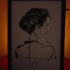 Embrace Tranquility with LightMask’s Lighted Shadow Box Featuring a Peaceful Woman