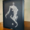 Confident Elegance: Woman Listening to Music Shadow Box Frames